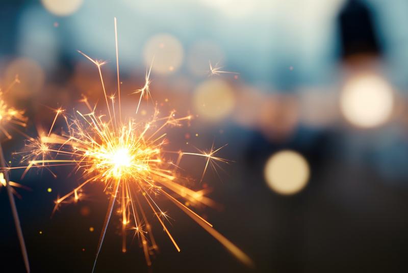 Coaching Report: Resolutions Sparklers against a city background